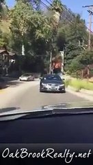 Los Angeles driver driving backwards on laurel canyon from Mulholland to sunset!