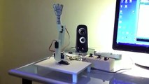 Arduino project robot arm controlled with two Playstation analogical sticks