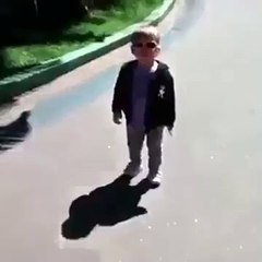 baby scared by its own shadow