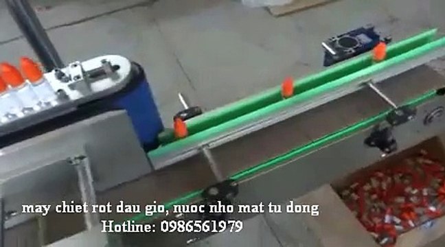 máy chiết rót, đóng nắp chai dầu gió , thuốc nhỏ mắt 0986561979