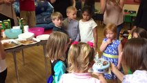 Kid hilariously blows out birthday girl's candle!