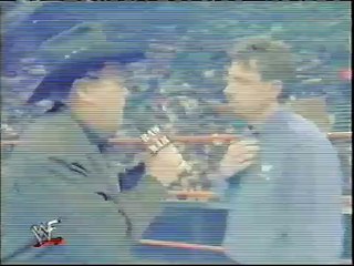 Jim Ross kicks Michael Cole in the nuts