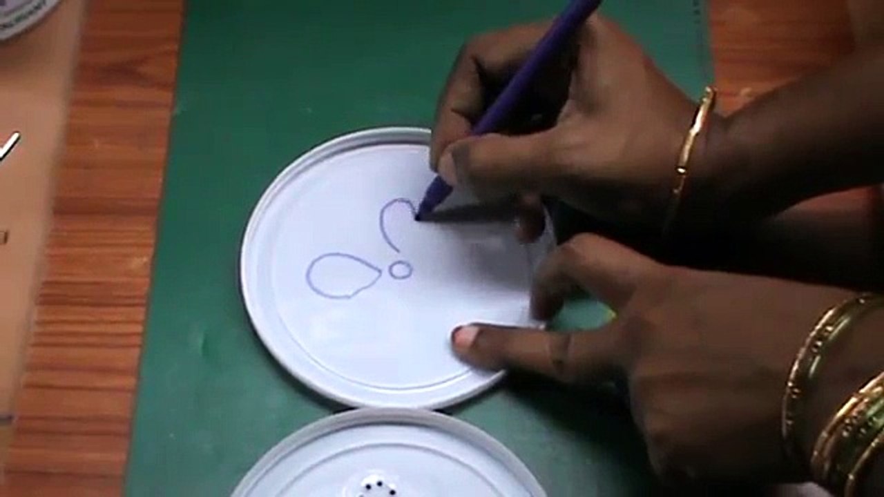 NIKSHIPTAM:How to make easy rangoli (Muggulu or kolam) border design.