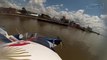Aerobatic pilot dips plane wing into river
