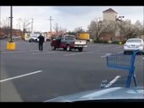 Kung fu man in parking lot. Music by Hans Zimmer