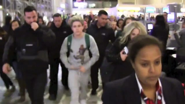EXCLUSIVE: One Direction Niall Horan Gets Mobbed by Fans at Los Angeles Airport