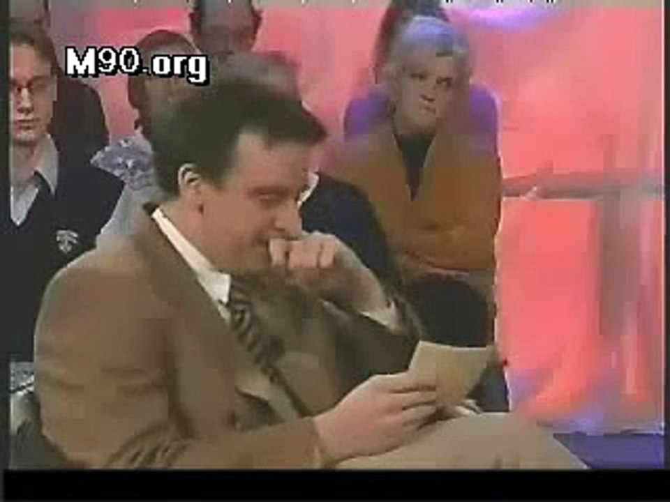 Talk show host laughs at guest