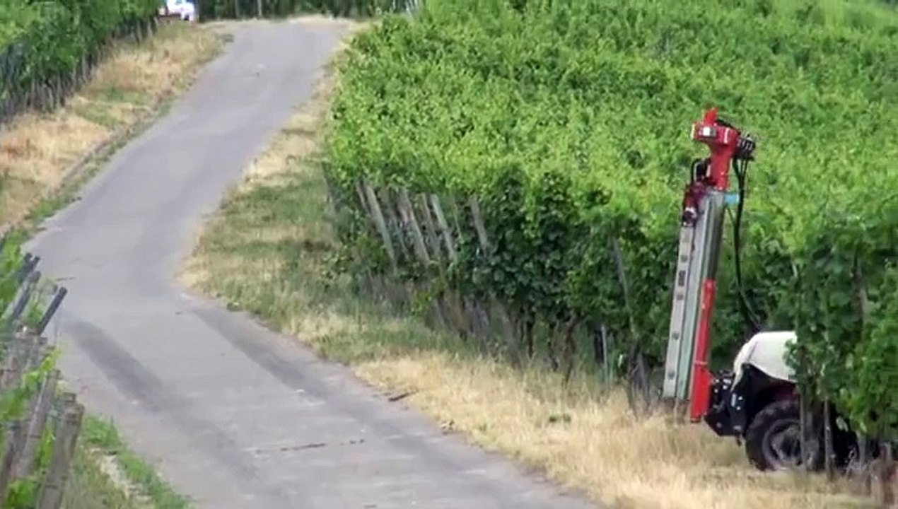 Rally car almost hits tractor during race