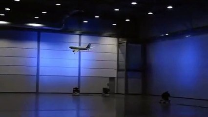 Plane Flying inside Hall
