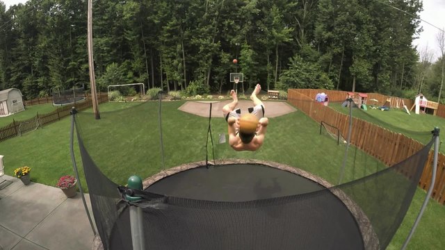 Two flips, two basketballs, one epic trick shot!