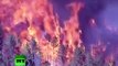 Los bomberos comienzan a contener los grandes incendios forestales en EE. UU.