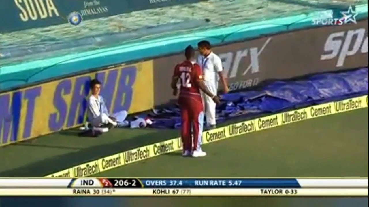 Rare funny incident in cricket .. ball boy stopping four before touching the rope