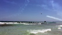 Most American Fly Over Ever: Blue Angel Buzzes So Close To Florida Beach It Sends Umbrellas Flying Everywhere