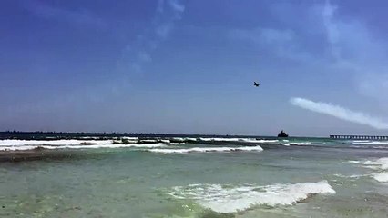 Fighter Aircraft Flying Over Beach