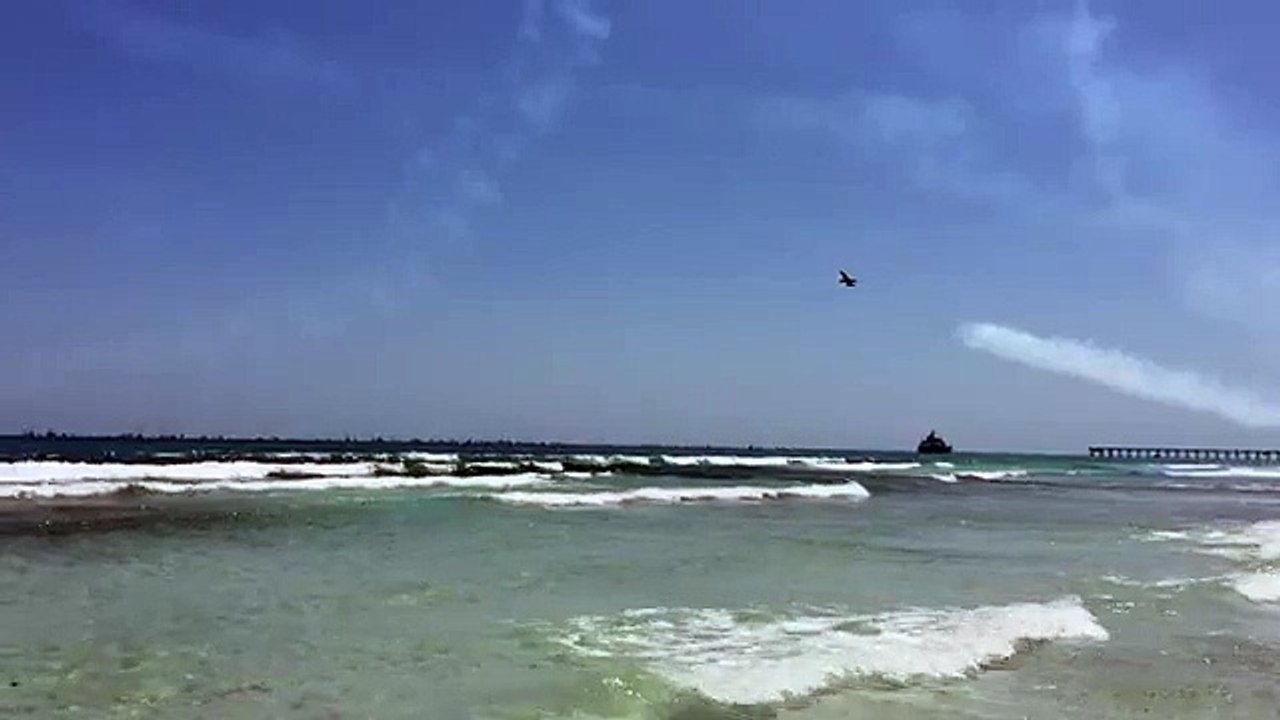 Fighter Aircraft Flying Over Beach