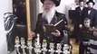 Mohorosh of Breslov Lighting Chanukah Candles