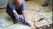 Removing glued down wood floor from concrete.