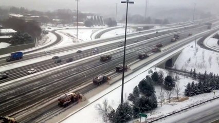 Snowplows Clearing Highway 401 in Toronto