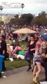 Couple having some fun and pleasure during music festival in front of people