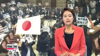 Lower house approves Japanese PM Abe's controversial security bills