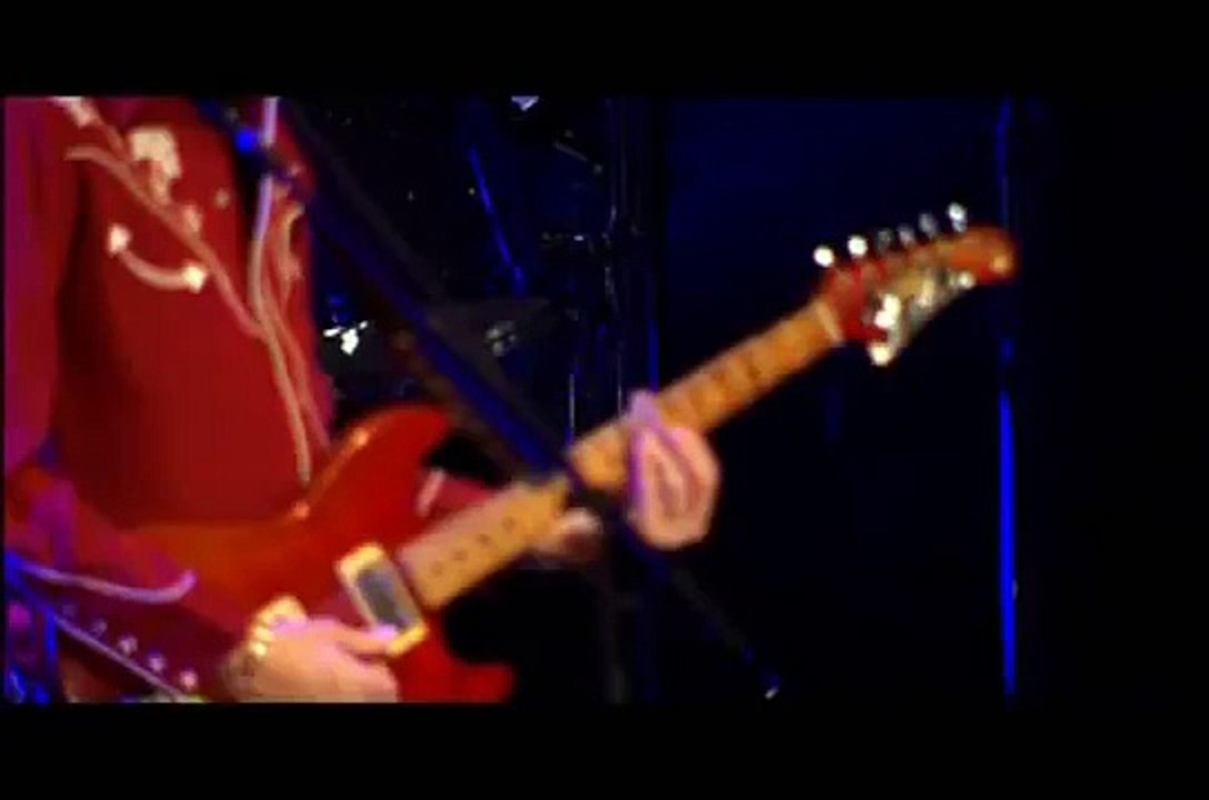 Sheryl Crow Performing " I Shall Believe "