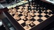 Playing with my triple weighted chess set in my Magellan Chess Computer