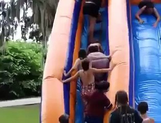 Fat woman falls down steps & wipes out a line of kids