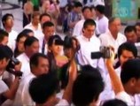 Burmese Democracy Leader Aung San Suu Kyi Visits Pagoda with Her Son