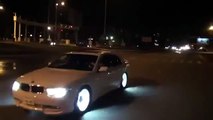 White Led Glowing Rims on BMW 7 Series at Night