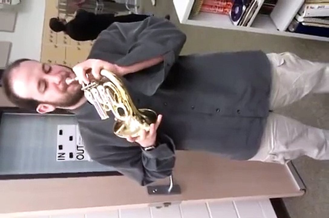Ryan Palmer plays a piccolo French horn