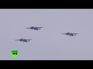 Vintage fighters, bombers fly over Washington in WW2 commemoration