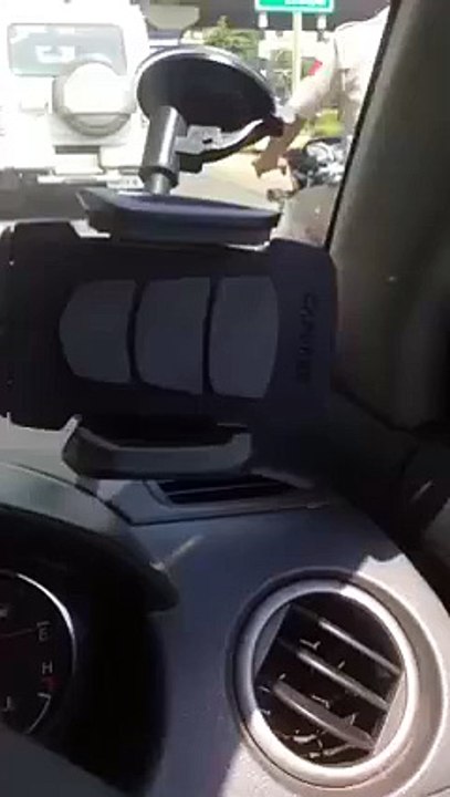 police violating traffic rules - riding bike without helmet