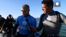 Watch: Surfer fights off shark attack mid-competition
