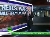 RT: News Reporter says war is Hell, US government controlled by satanists
