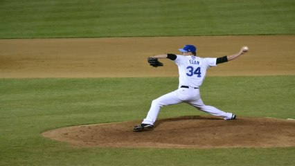 Baseball - der schnelle Wurf des Pitchers