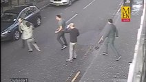 Man falls on pavement by failing to hit someone in the back during Road rage