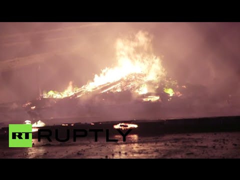 Baltimore Riots: Buildings on fire, stores looted, state of emergency declared