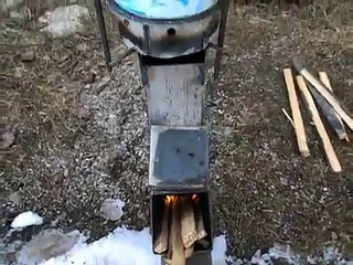 Stirling engine and rocket stove -test run