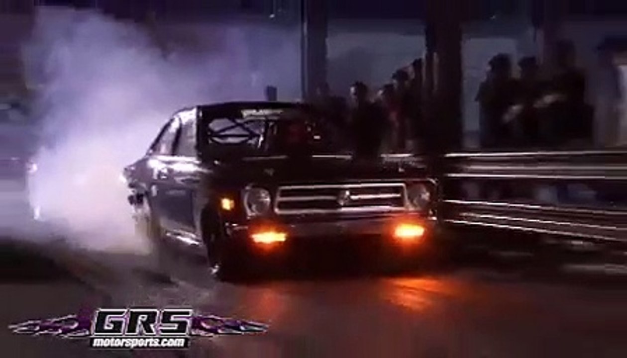 Jessica Barton with Men in Black Datsun 1200 Coupe