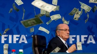 Lee Nelson  Showers Sepp Blatter with fake money