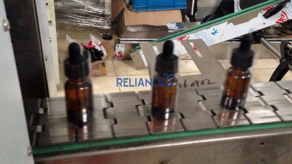 15ml glass dropper bottle heat shrinking machine for caps and bottle body / amy@pharma-reliance.com