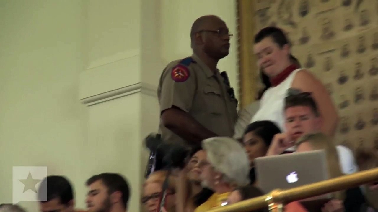 Calling Abortion "Genocide," Protester Escorted from Senate