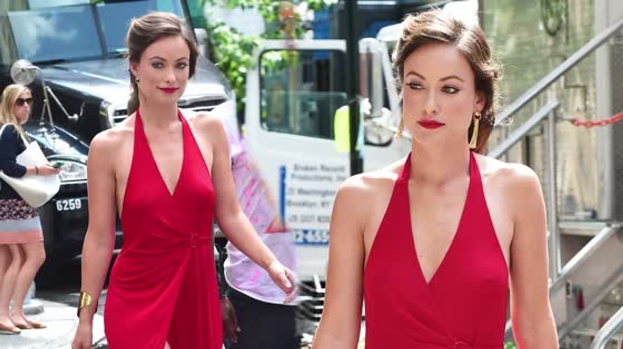 Olivia Wilde Looks Stunning in Red Dress While On Set