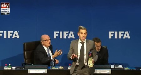 The comedian Lee Nelson throws money to FIFA's president Sepp Blatter | HD