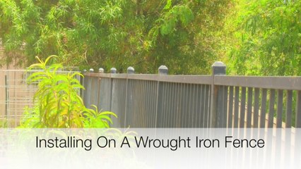 Coyote Roller Installation On A Wrought Iron Fence