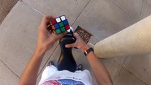 Solving a cube while juggling on a unicycle
