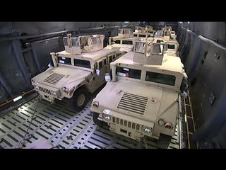 Poroshenko gets military Humvees from US, takes a spin