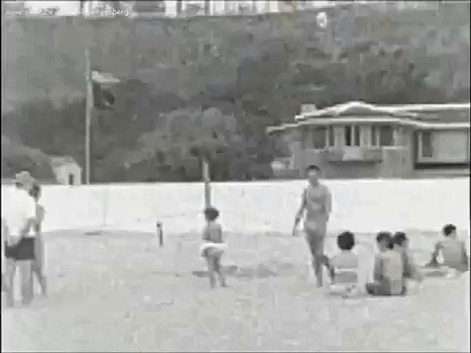 August 19, 1962 - President John F. Kennedy takes a swim at the beach in Santa Monica, CA.