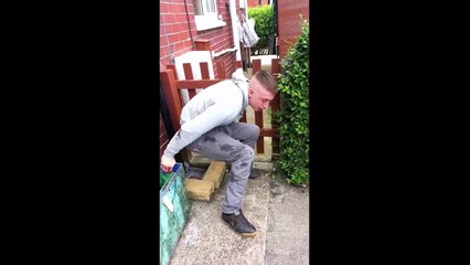 Drunk guy fights a bush and gets KO