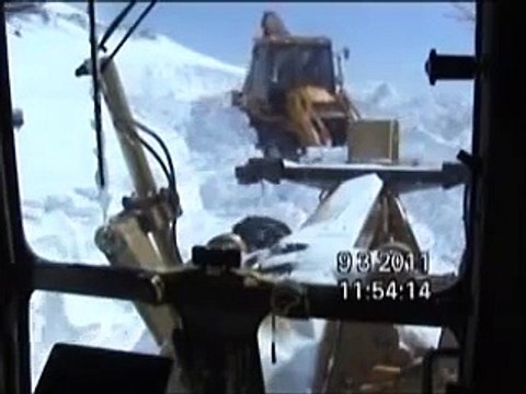Motorgrader and Backhoe Loader Snow Plowing